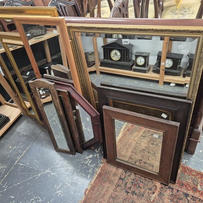 Lot 172 - A large collection of various wall mirrors.