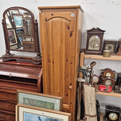 Lot 173 - A pine hall cabinet.