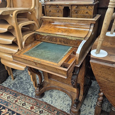 Lot 180 - A Victorian walnut piano-top Davenport desk...