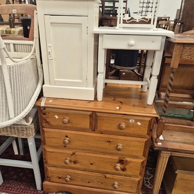 Lot 194 - A pine chest of drawers , a painted bedside...