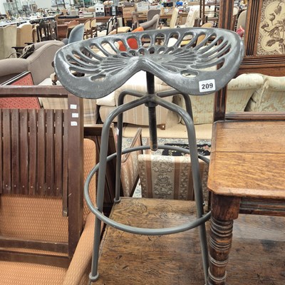 Lot 209 - A tractor seat stool