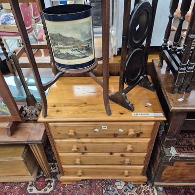 Lot 215 - A small pine chest of drawers, an occasional...