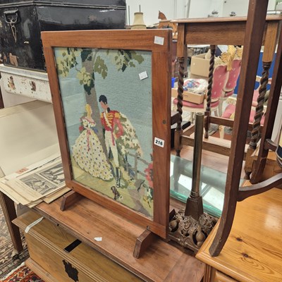 Lot 216 - A firescreen and a lamp base.