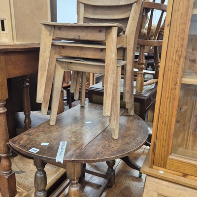 Lot 238 - A small oak drop leaf table, three child...