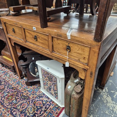 Lot 247 - An oriental hardwood side table.