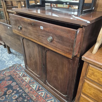 Lot 259 - An early 19th century mahogany secretaire side...