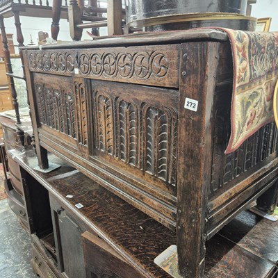 Lot 272 - An 18th century carved oak coffer. W 104 D 55...