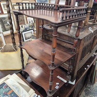Lot 275 - A Victorian three-tier wot-not with gallery top.