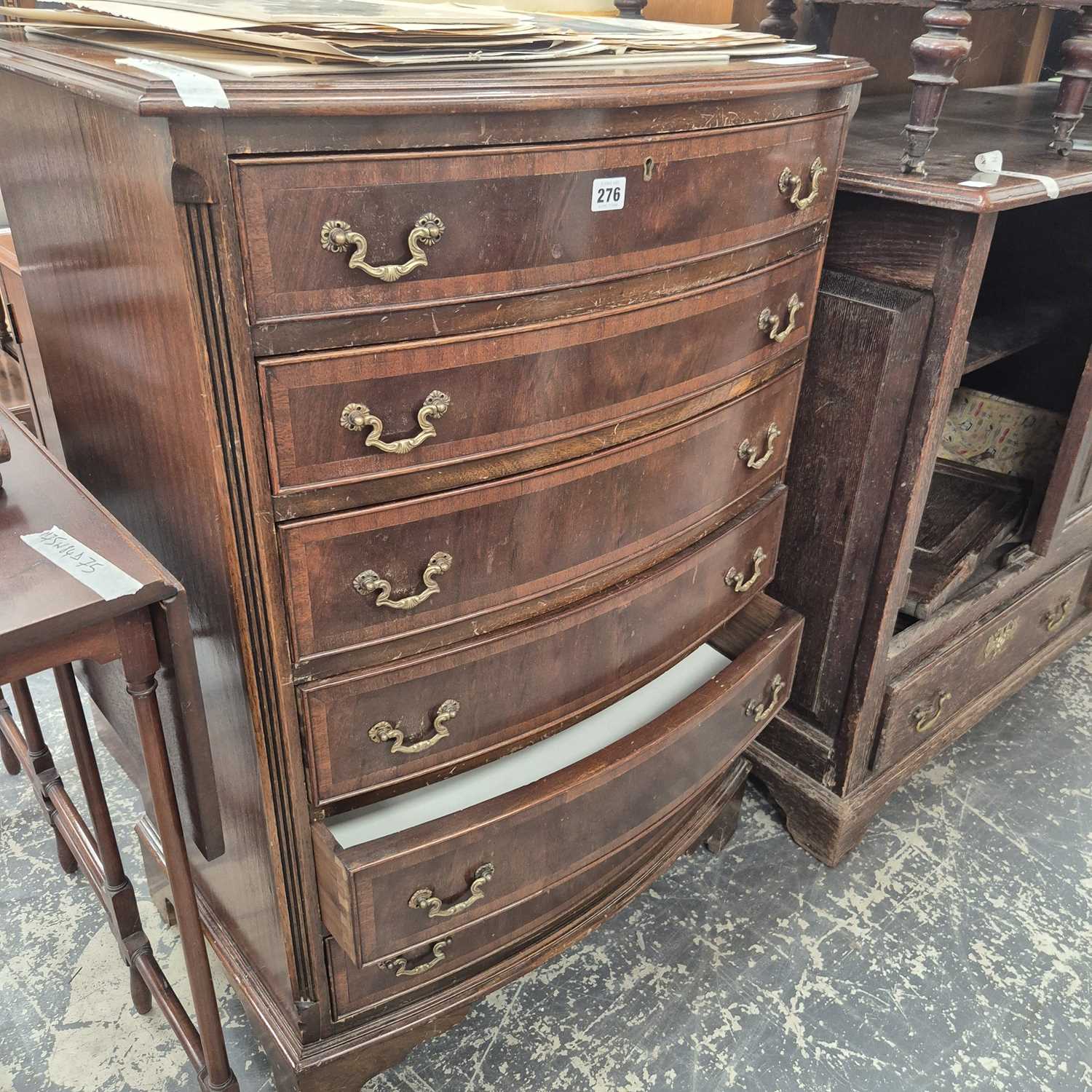 Lot 276 - A Georgian-style mahogany bow-front chest of...