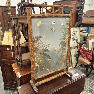 Lot 278 - An antique bamboo and glazed panel firescreen.