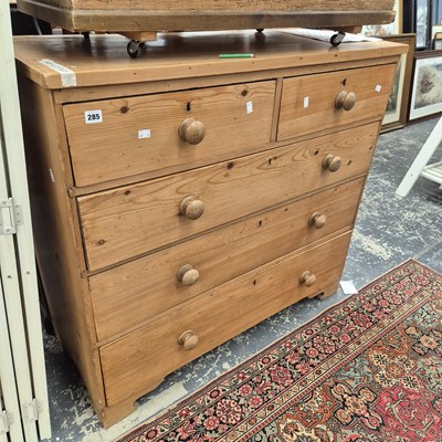 Lot 285 - A 19th century pine chest of five drawers. 109...