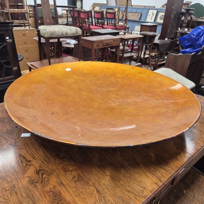 Lot 307 - a large decorative orange bowl.