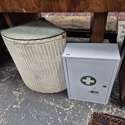 Lot 312 - A first aid cabinet and a loom box.