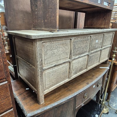Lot 318 - An antique cotswold school, oak panel coffer.