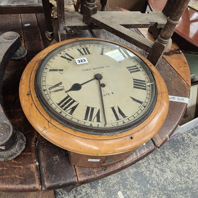 Lot 323 - An antique style wall clock