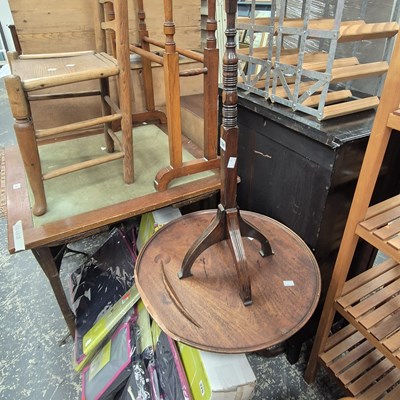 Lot 324 - A rosewood candle stand and a tripod wine table.