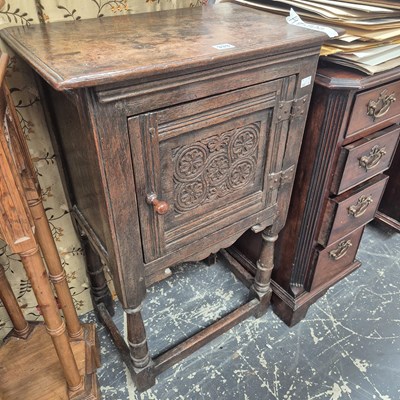 Lot 333 - An 18th century style oak single door cabinet...