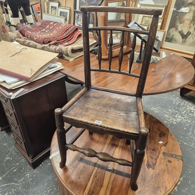 Lot 336 - A rustic side chair.
