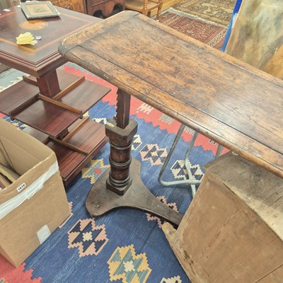 Lot 344 - An adjustable reading table