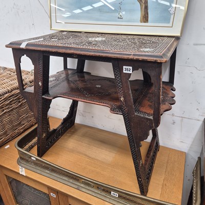 Lot 352 - A middle eastern carved and inlaid side table.