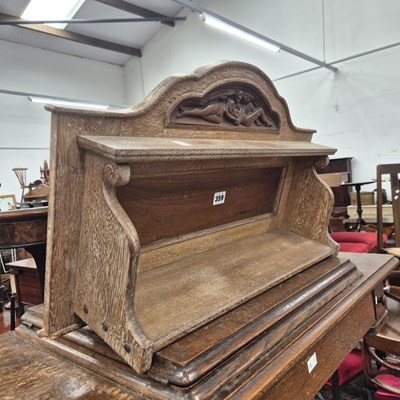 Lot 359 - An antique carved wall shelf