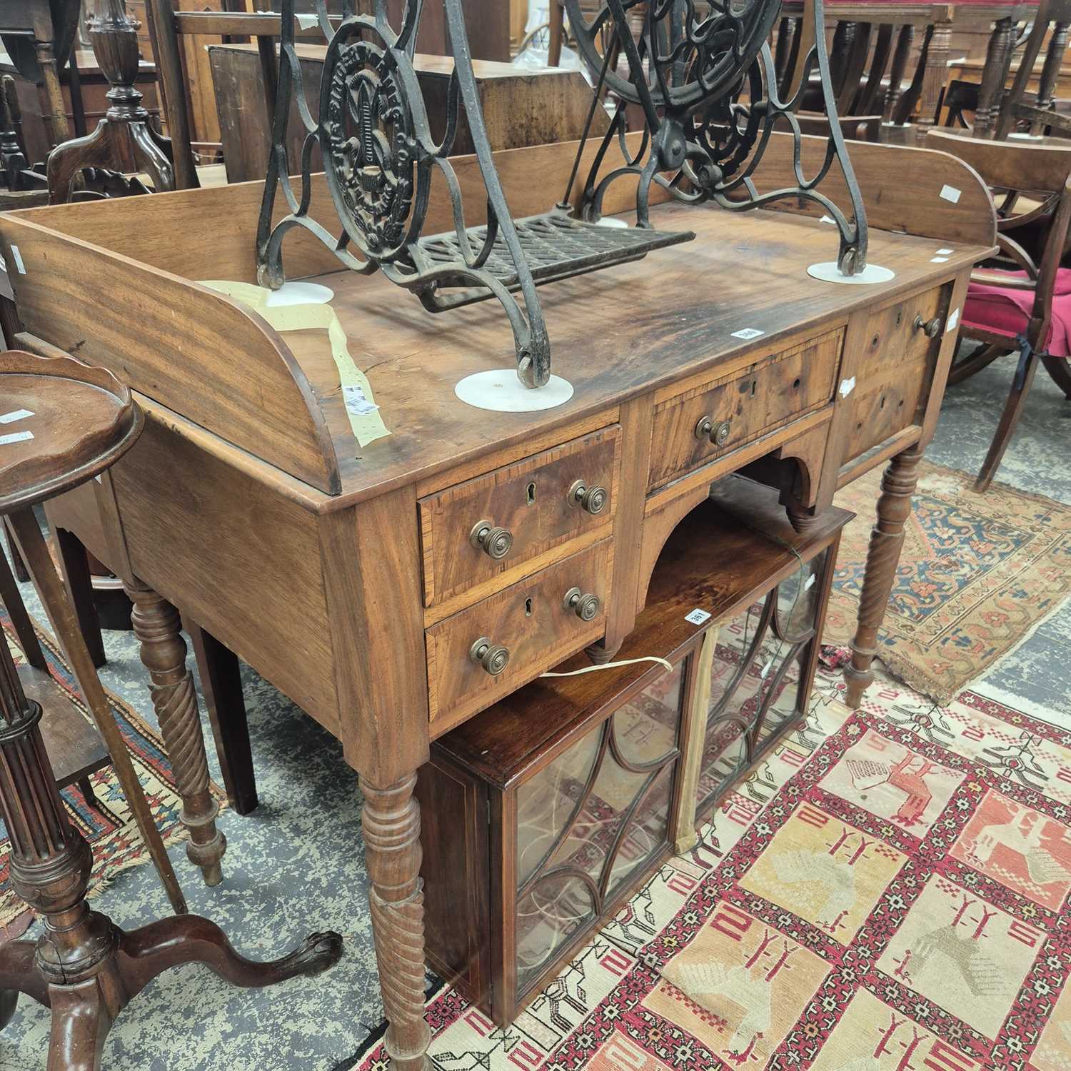 Lot 360 - A late Georgian mahogany gallery back washstand