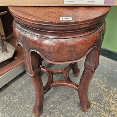 Lot 1247 - A Chinese hardwood four legged stool
