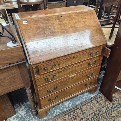Lot 385 - A Geo III mahogany bureau