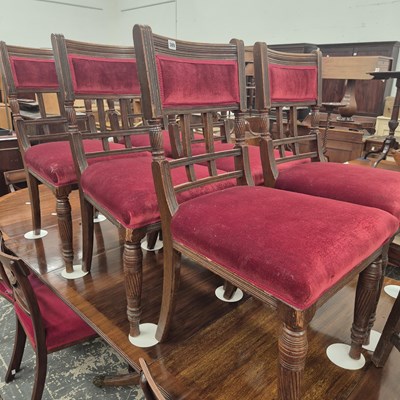 Lot 389 - A set of six Victorian oak dining chairs.