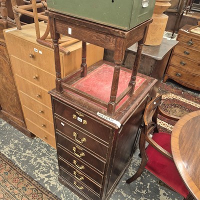 Lot 390 - A filing cabinet and an oak occasional table