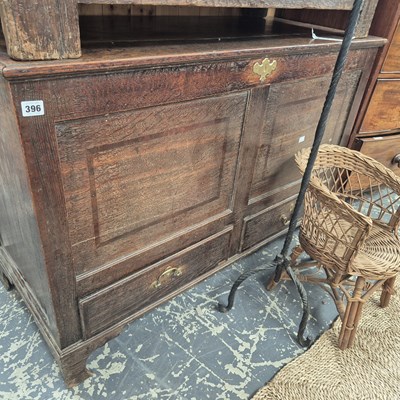 Lot 396 - An 18th-century oak mule chest coffer