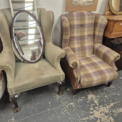 Lot 402 - Two wing back armchairs