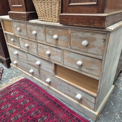 Lot 412 - A large painted pine multi-drawer chest 153 x...