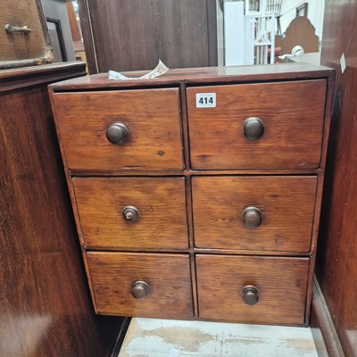 Lot 414 - A nest of six apothecary-type drawers