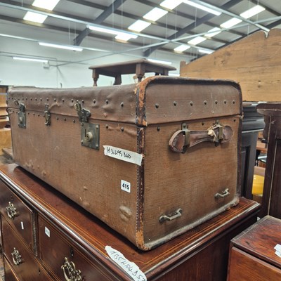 Lot 415 - A vintage canvas covered cabin trunk with...