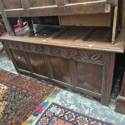 Lot 418 - An 18th century oak panel front coffer with...