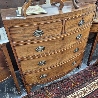 Lot 427 - A Geo III mahogany bow front chest of five...