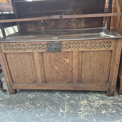 Lot 440 - An 18th-century oak panel front coffer with...