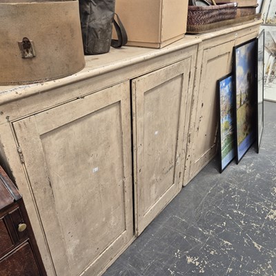 Lot 442 - A pair of antique pine two door cabinets. H...