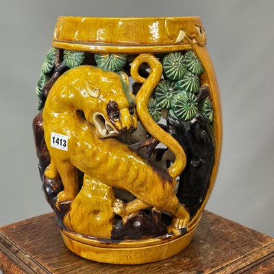Lot 1413 - A Chinese ochre ground garden seat, the sides...