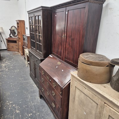 Lot 444 - A Georgian mahogany bureau-bookcase 196 cm high