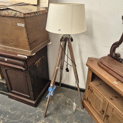 Lot 452 - A tripod standard lamp