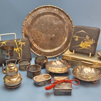 Lot 1424 - Japanese sterling and white metal wares: three...