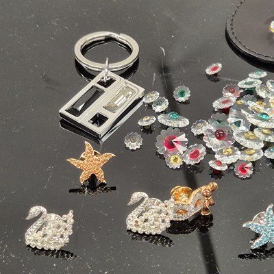 Lot 578a - Swarovski- a luggage tag, key ring, loose...