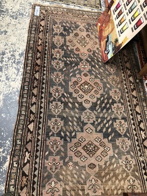 Lot 1643 - An antique caucasian rug, 210 x 117cms,...