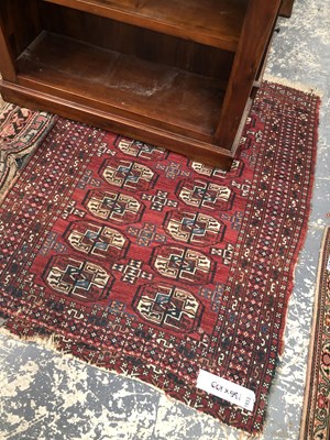Lot 1653 - An antique Bokhara rug, 136 x 100cms