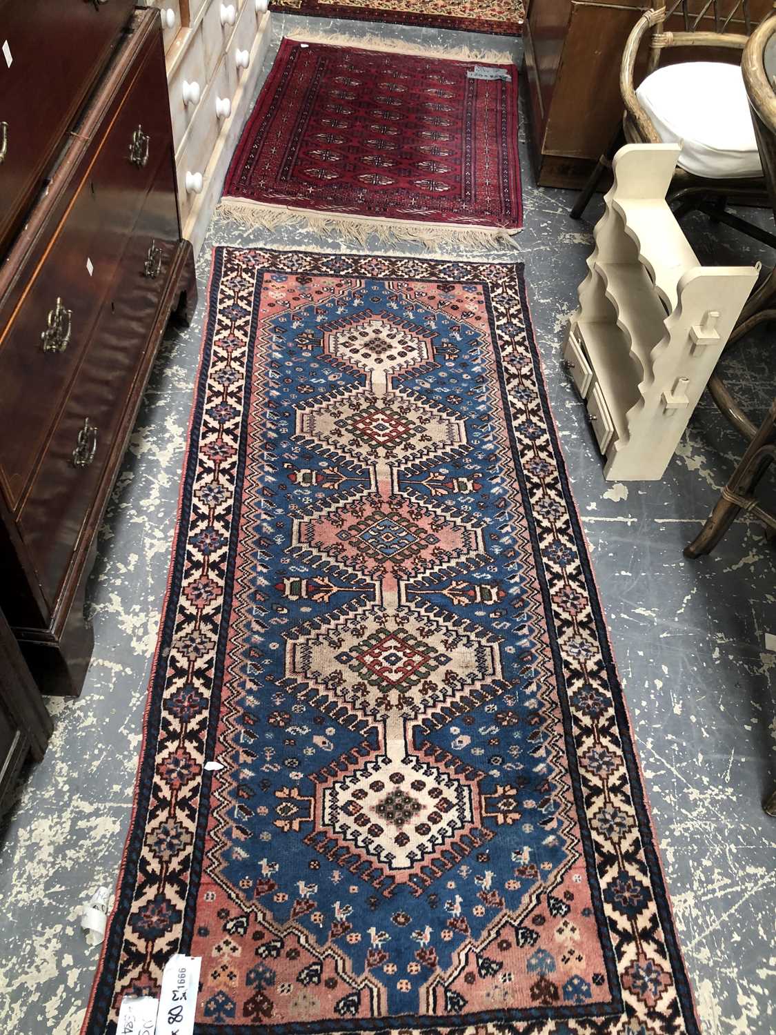 Lot 1666 - Three Oriental rugs, a prayer rug, 125 x 68cms,...