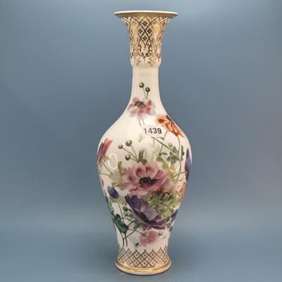 Lot 1439 - A 19th century milk glass baluster vase...