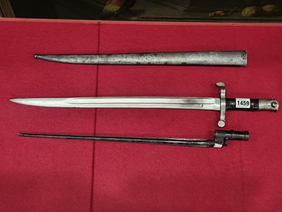 Lot 1459 - An 1886 Steyr bayonet with an iron scabbard...