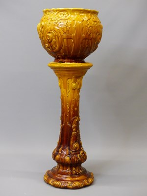 Lot 1468 - A late 19th century ochre glazed pottery...